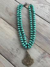 Green Beaded Necklace with Brass Pendant