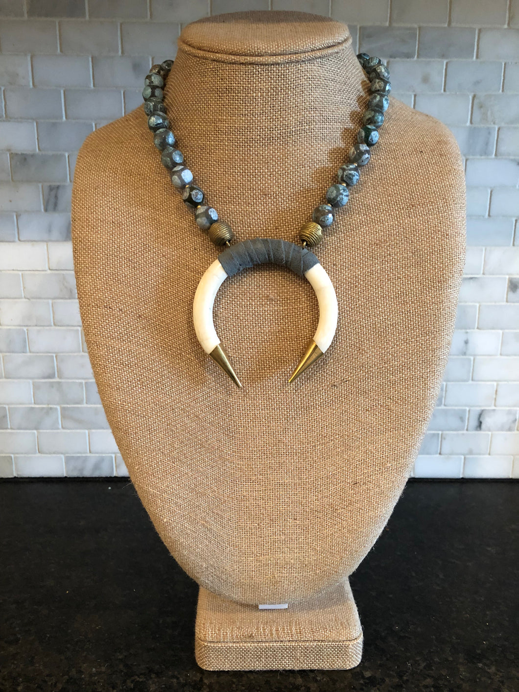 Suede wrapped bone necklace