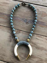 Suede wrapped bone necklace