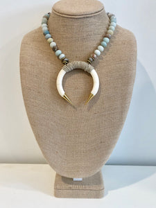 Suede Wrapped Crescent Horn Necklace