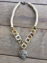 Vintage brooch with Buffalo Horn and Bone Beaded Necklace