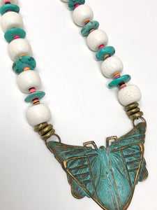 Coral necklace with moth pendant